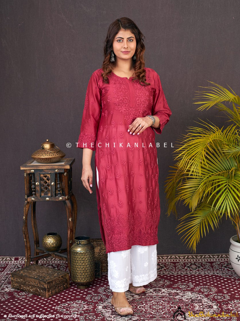 “Straight chikankari kurti with handcrafted embroidery on Chanderi fabric styled with statement earrings”