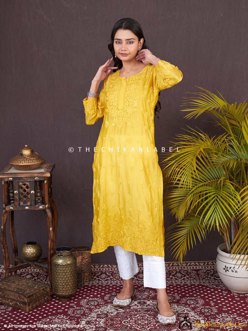 “Full-length view of Chanderi straight chikankari kurti styled with palazzo pants for festive wear”