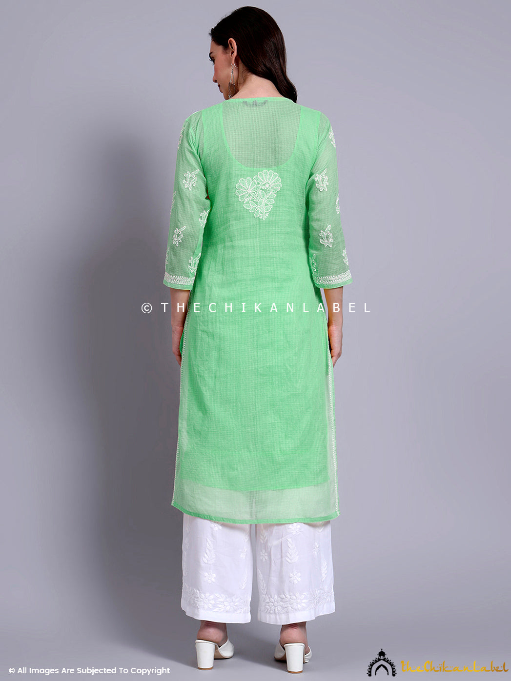 Elegant straight kurti made from Kota cotton with delicate Lucknowi chikankari work and stitched inner for comfortable daily wear.

