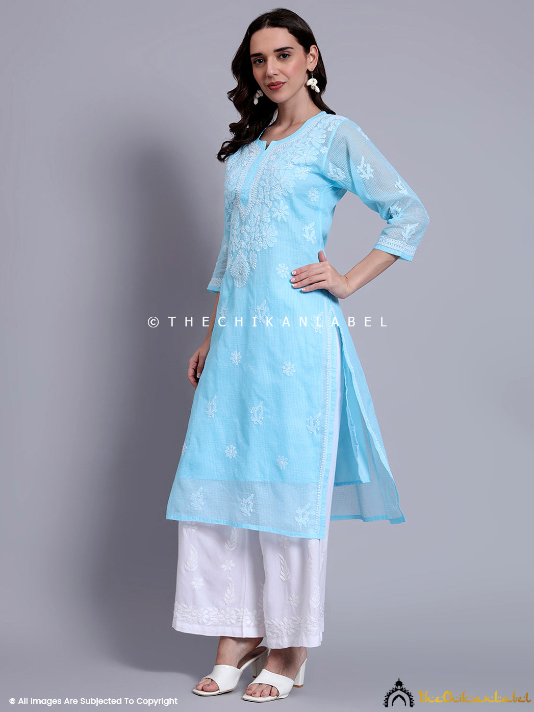 Semi-sheer straight kurti with detailed embroidery and attached inner, offering comfort, elegance, and everyday versatility.

