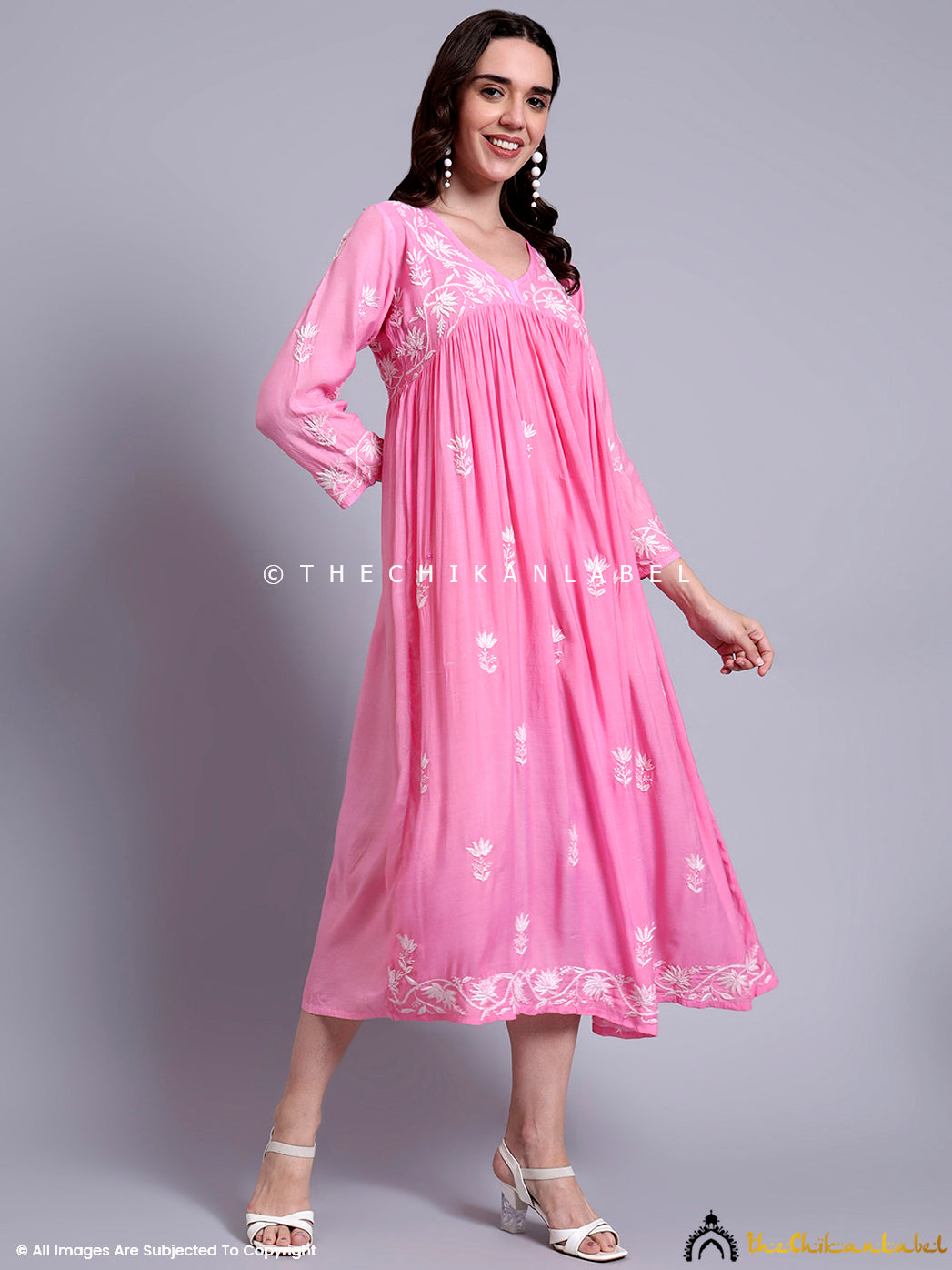 Muslin Chikankari Anarkali ideal for festive or casual wear with traditional motifs and fine craftsmanship.

