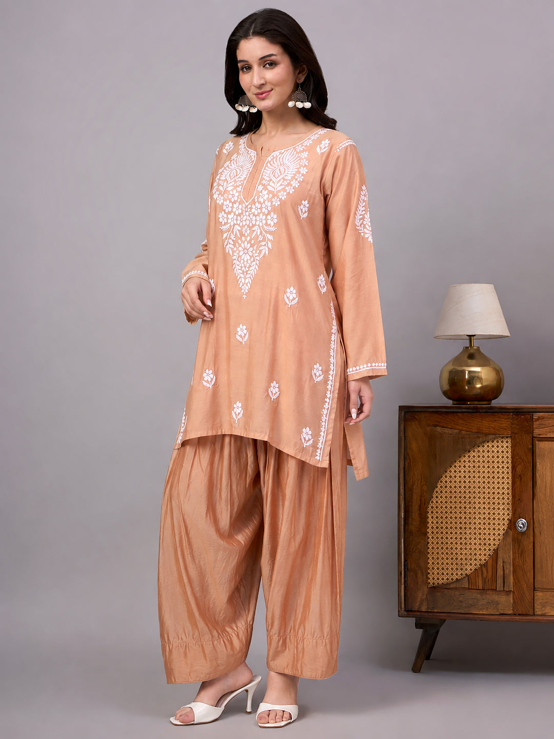Elegant Chikankari farshi set crafted in Chanderi fabric with embroidered floral motifs and a relaxed bottom silhouette for casual and festive occasions.