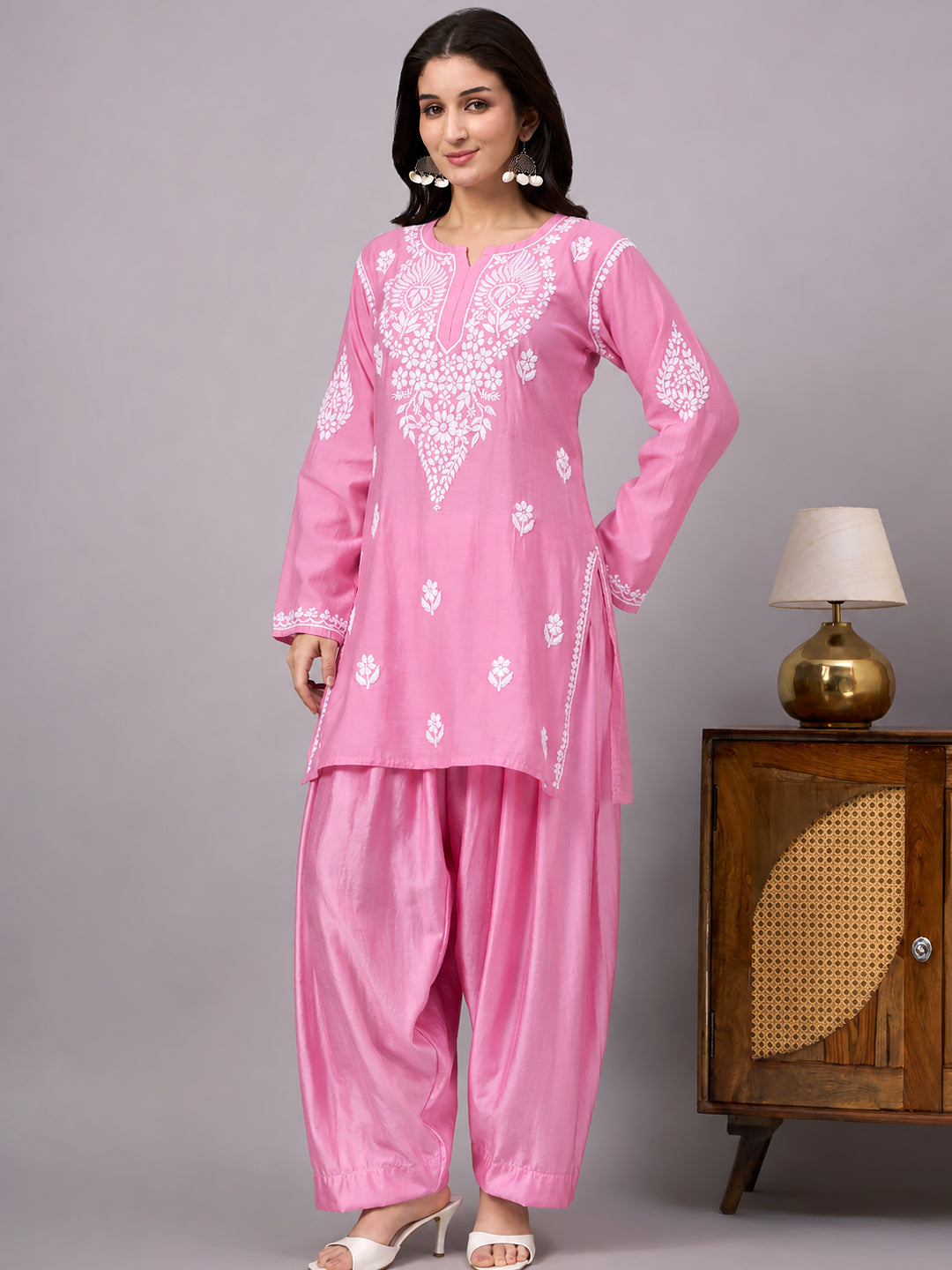Trending farshi set for women with detailed Chikankari embroidery, long sleeves, straight kurta design and coordinated relaxed farshi-style bottoms.