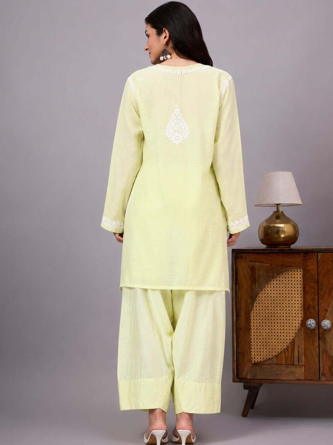 Traditional Chanderi farshi set featuring fine Chikankari embroidery, full-sleeve kurta styling and a relaxed coordinated bottom for modern ethnic wardrobes.