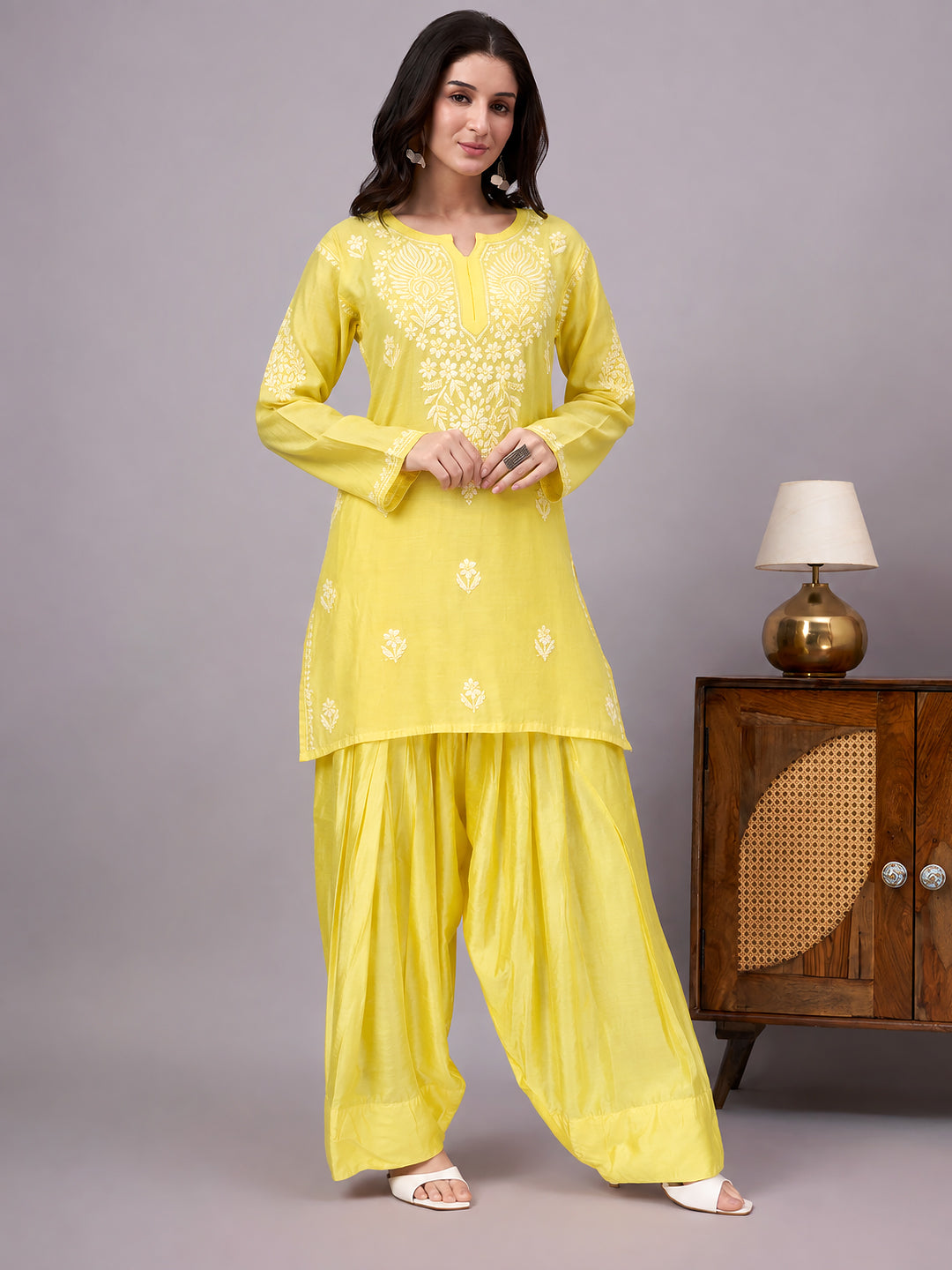 Women’s trending farshi set with a traditional embroidered kurta and comfortable farshi bottom, ideal for daytime events, family gatherings and regular wear.