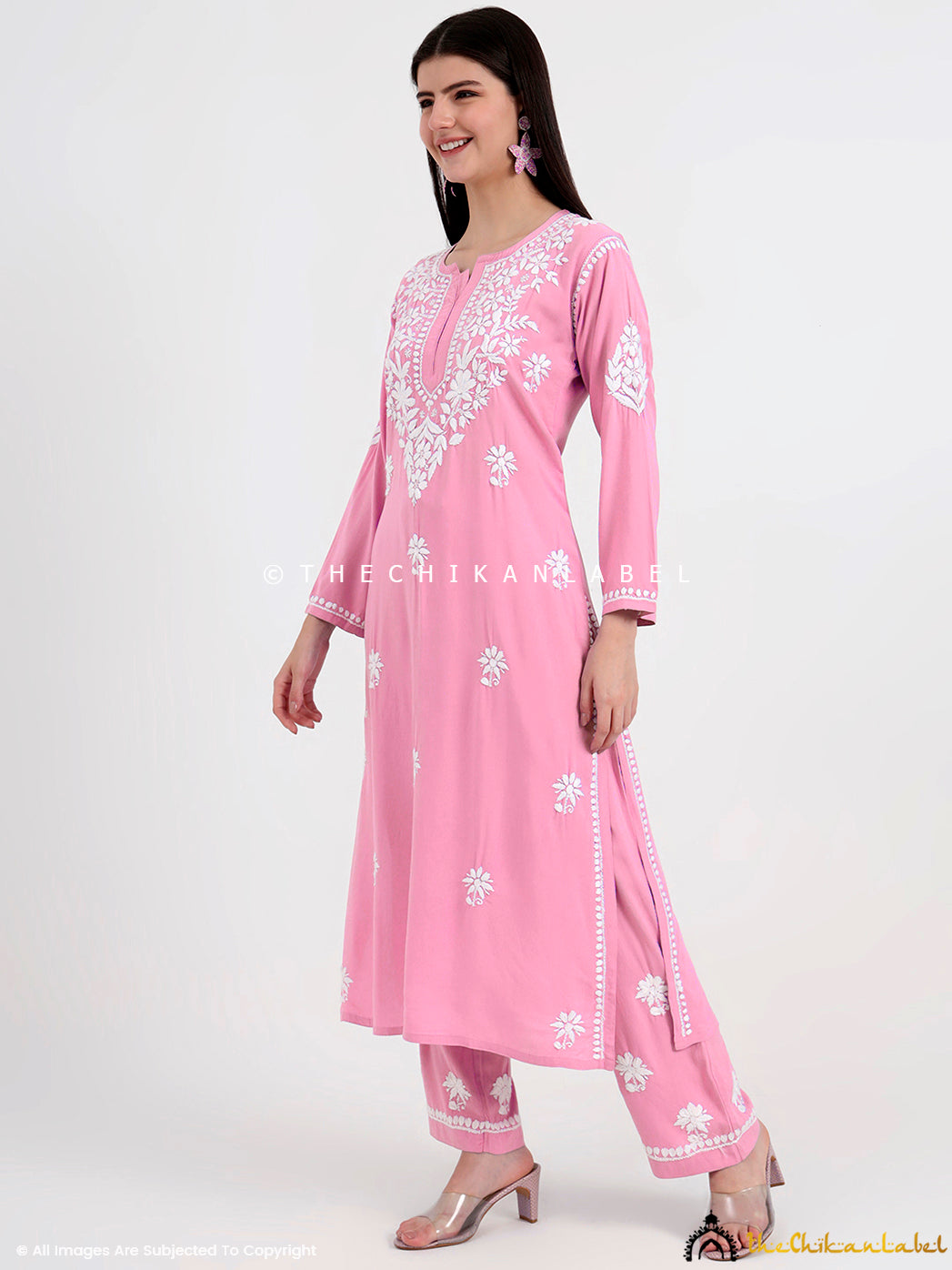 Stylish straight-cut kurti with full sleeves and matching palazzo pants showcasing authentic chikankari work.
