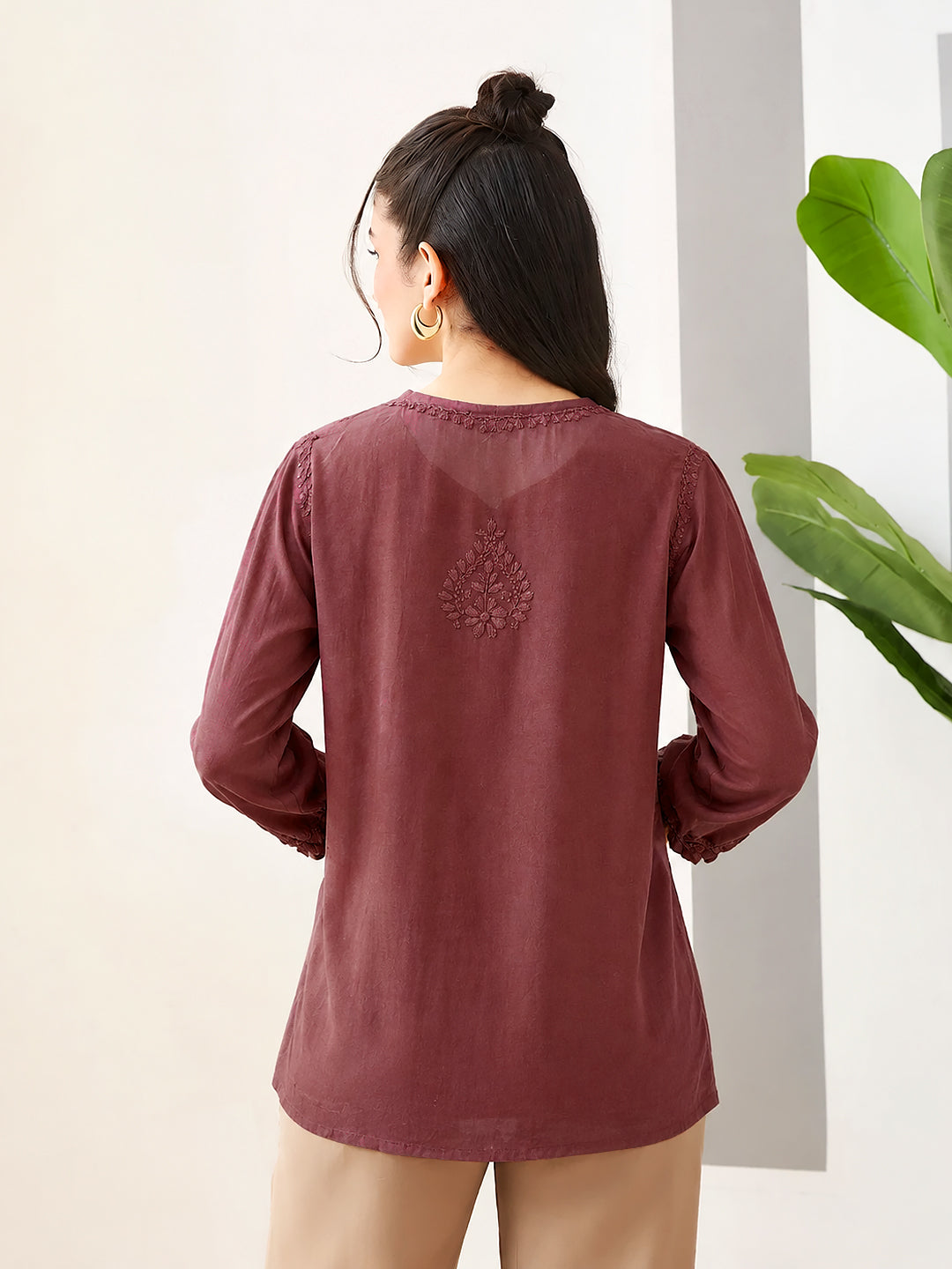 Amina Chikankari Top crafted in soft rayon fabric with intricate floral embroidery, short kurta length and three-quarter sleeves, styled for modern everyday wear.