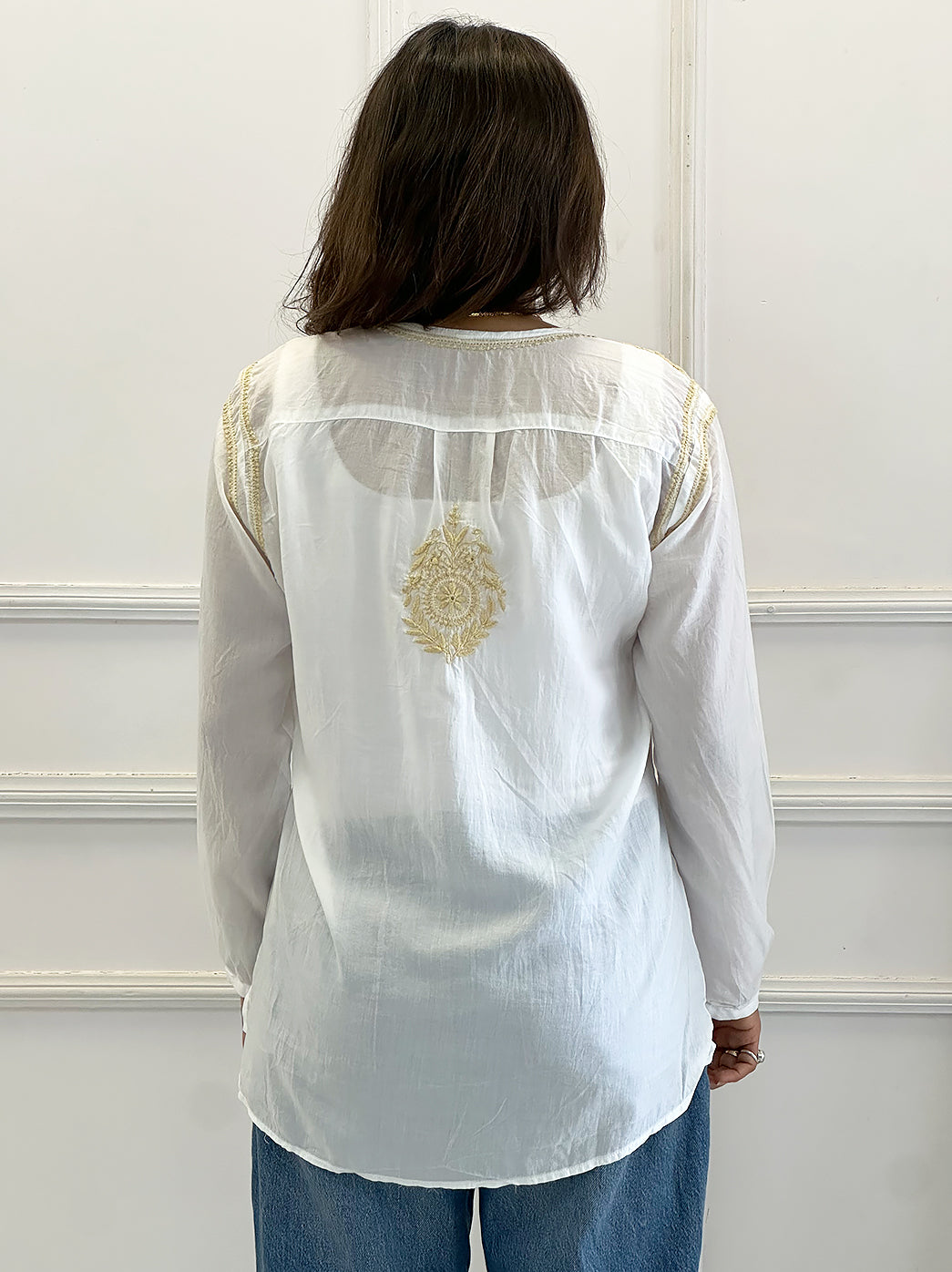 Women’s chikankari shirt in mulmul cotton with traditional hand embroidery and elegant front panel design