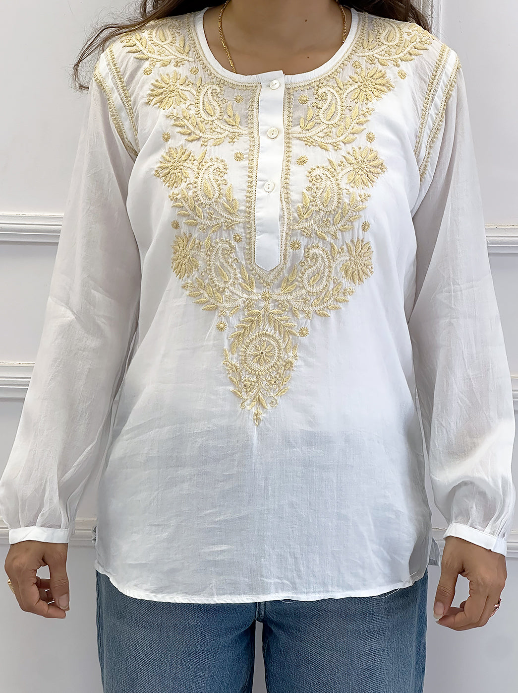 Lightweight mulmul cotton chikankari top with fine embroidery work perfect for daily styling and comfort