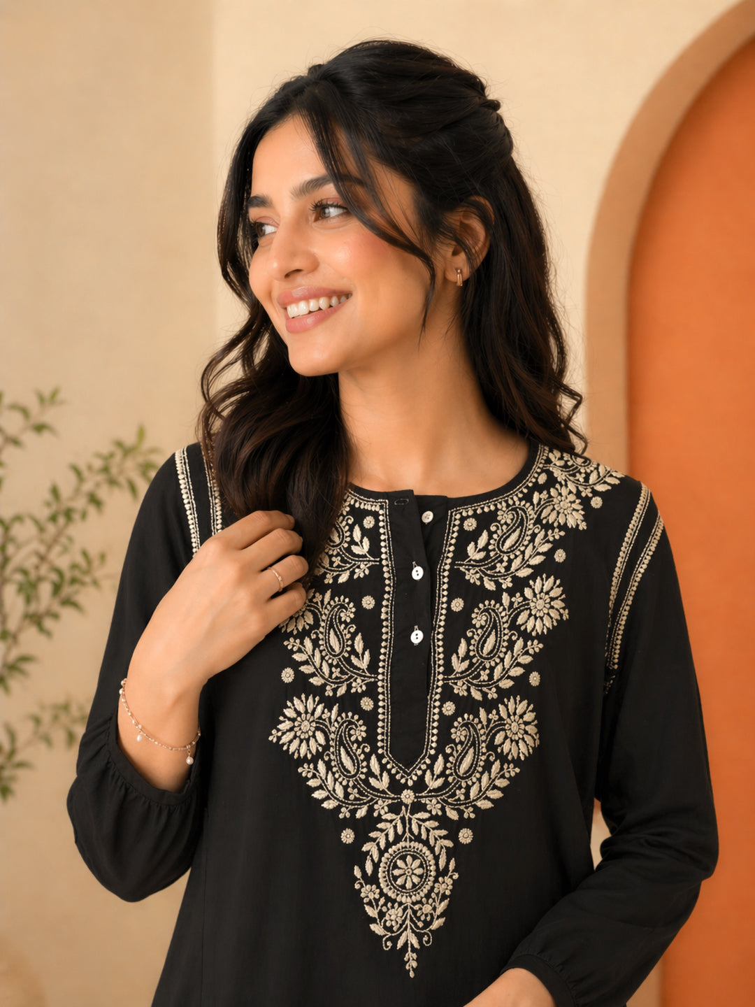Handcrafted chikankari kurti top for women with detailed traditional embroidery pattern on the front panel, full sleeves, and comfortable straight fit for casual and festive occasions.