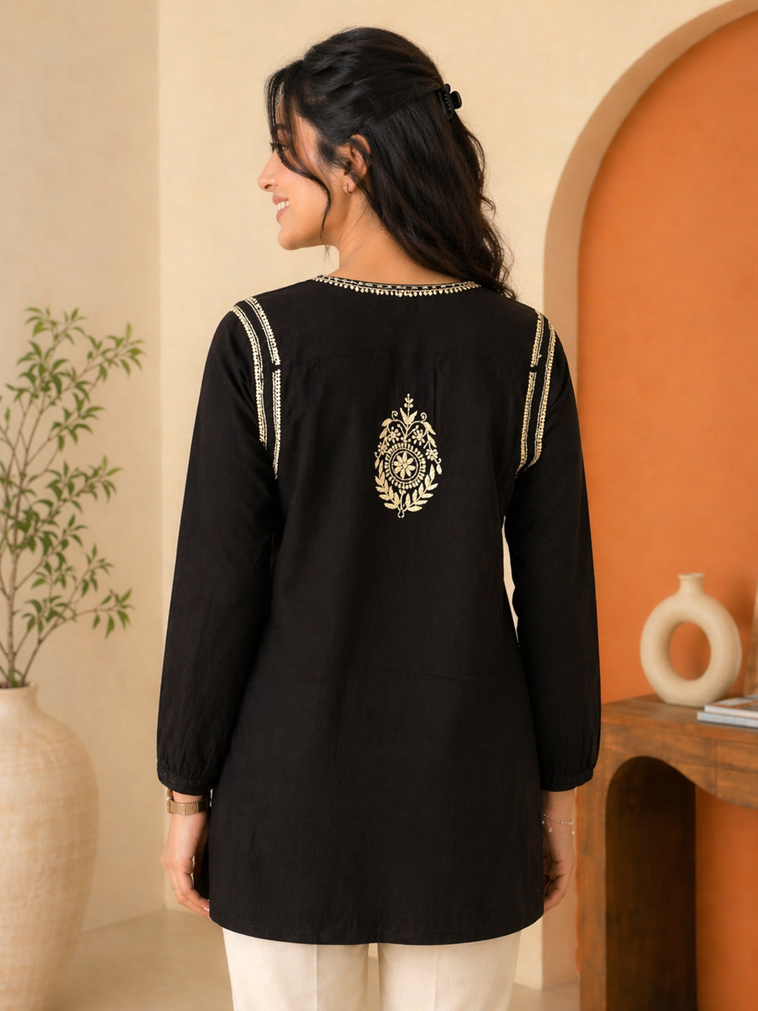 Premium cotton chikankari kurti with fine shadow work embroidery, round neck with button placket, and minimalist straight cut perfect for office wear and daily styling.
