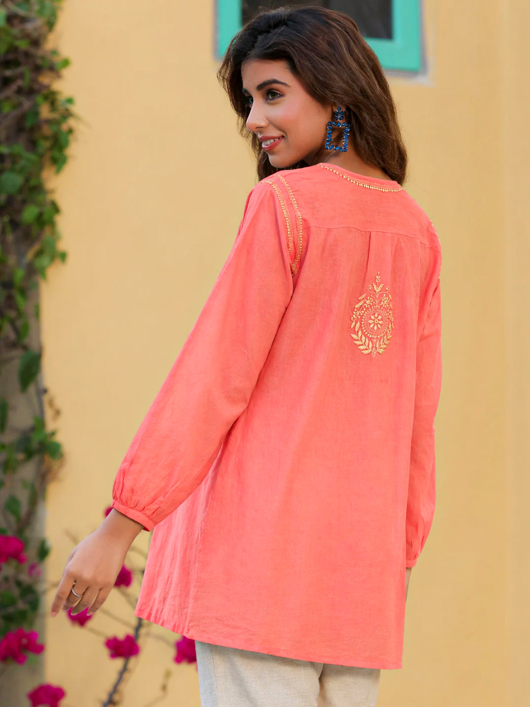 Women’s ethnic chikankari top with intricate hand embroidery showcasing floral motifs and traditional craftsmanship, ideal for summer wear and breathable comfort.
