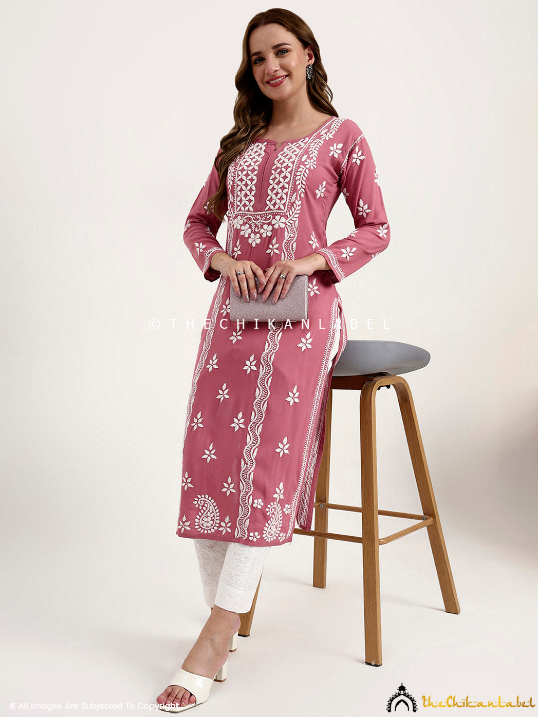 Trending women kurta in rayon with authentic hand-embroidered chikankari floral motifs.