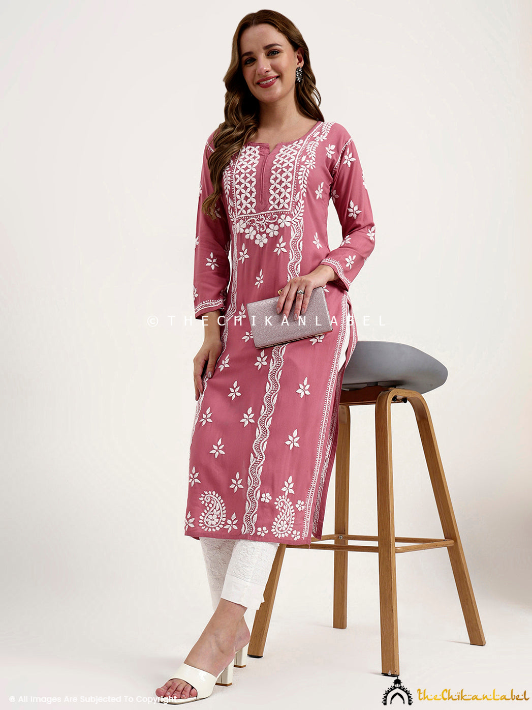 Comfortable rayon chikankari kurti designed in a straight cut for office and daily wear.