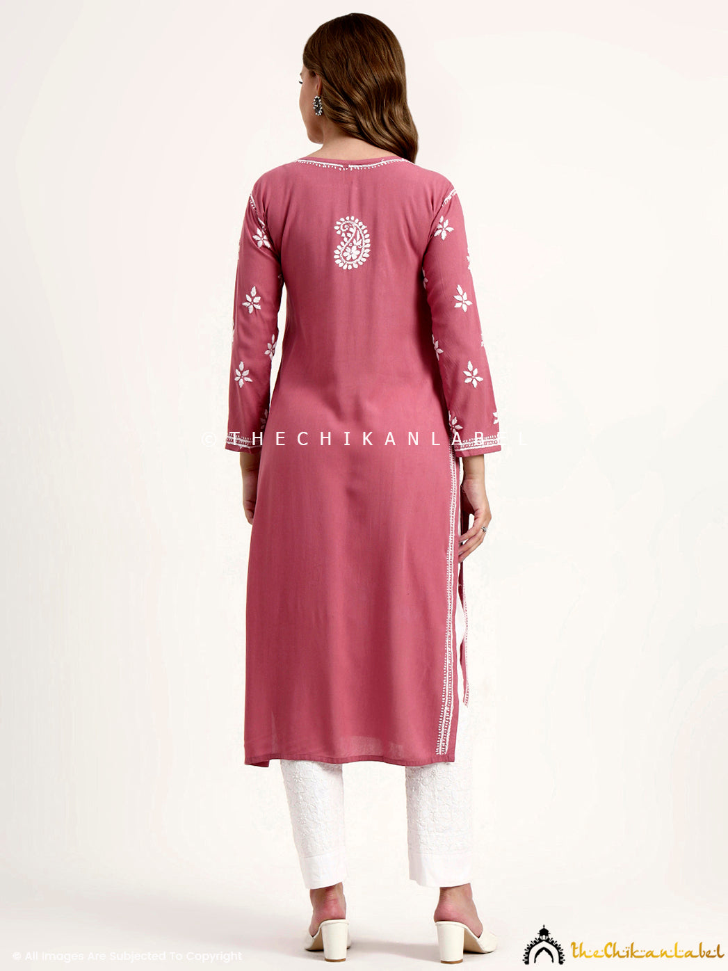 Stylish rayon chikankari kurti with elegant embroidery details for versatile wear.