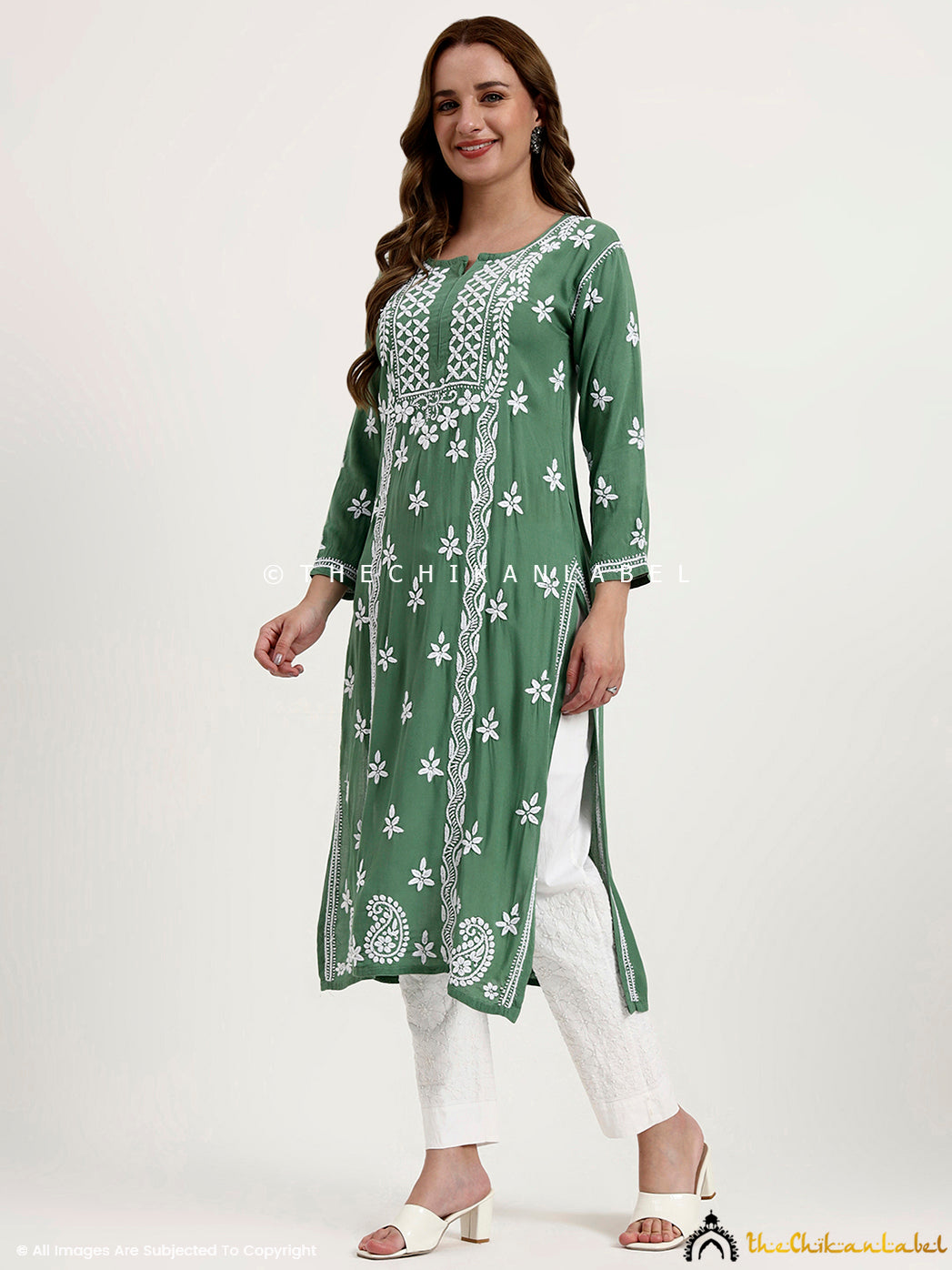 Comfortable rayon chikankari kurti designed in a straight cut for office and daily wear.
