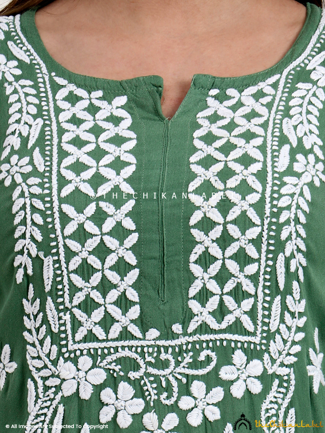 Elegant chikankari straight kurti crafted in soft rayon fabric with traditional embroidery details.