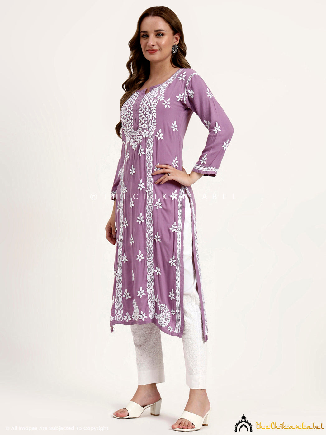 Comfortable rayon chikankari kurti designed in a straight cut for office and daily wear.