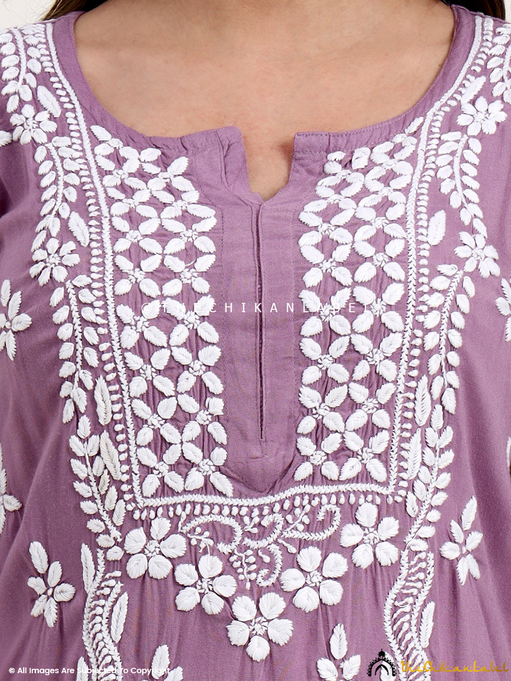 Elegant chikankari straight kurti crafted in soft rayon fabric with traditional embroidery details.