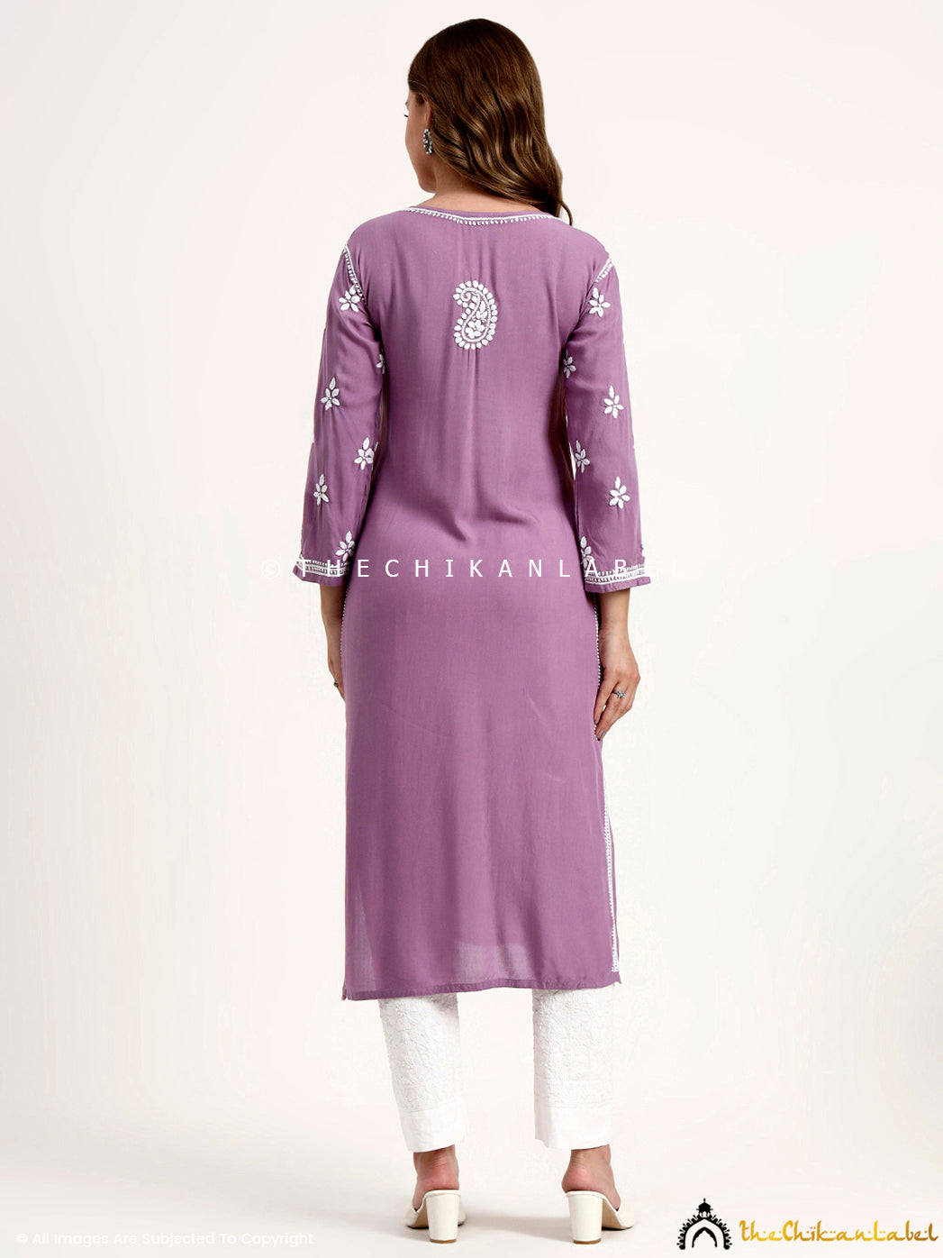 Trending women kurta in rayon with authentic hand-embroidered chikankari floral motifs.