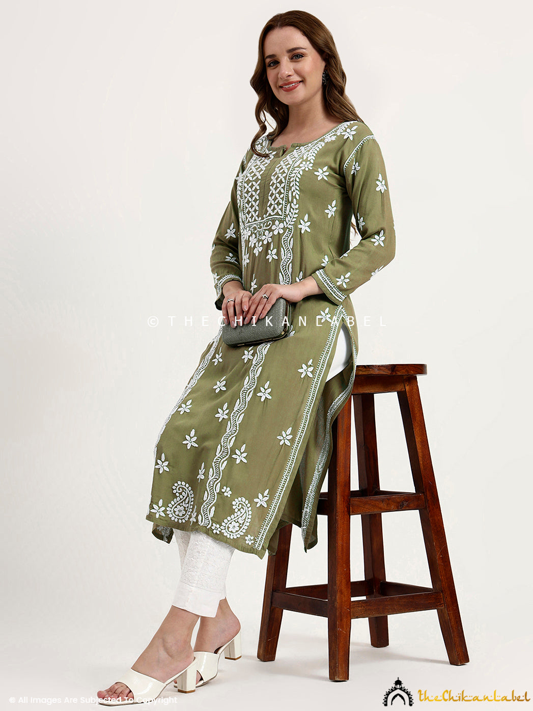 Soft rayon chikankari kurti with straight fit styling and handcrafted embroidery.