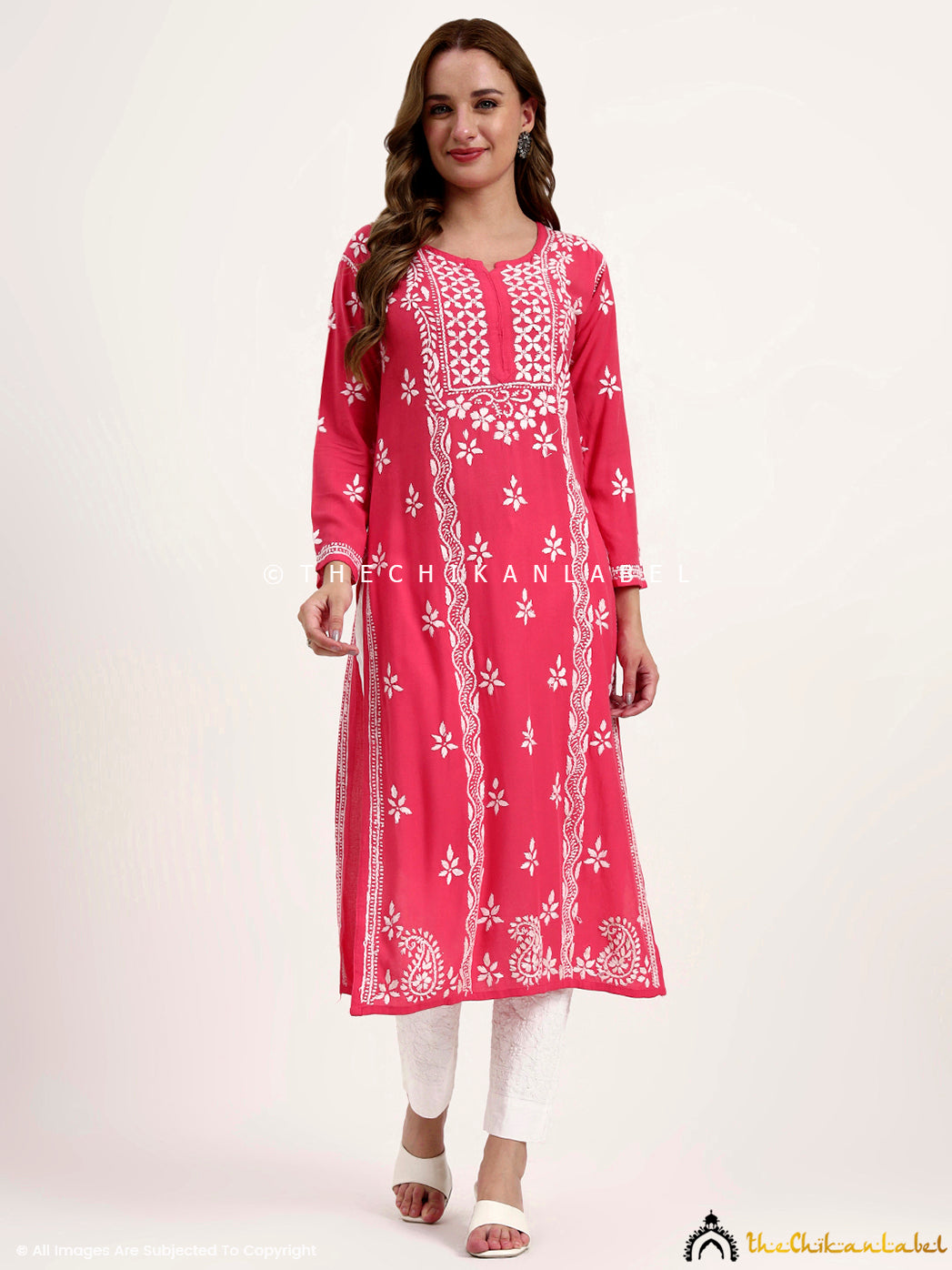 Women’s rayon chikankari kurti showcasing fine embroidery and straight silhouette design.