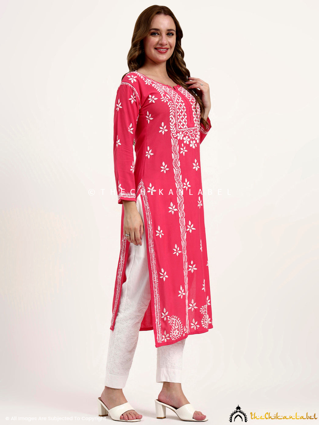Stylish rayon chikankari kurti with elegant embroidery details for versatile wear.