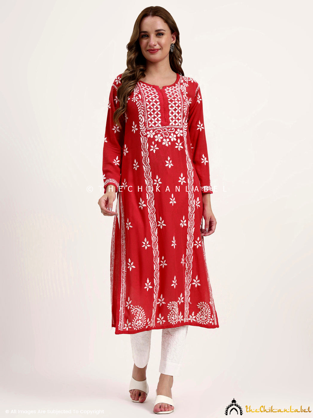 Women’s ethnic wear kurti in rayon featuring delicate chikankari floral patterns.