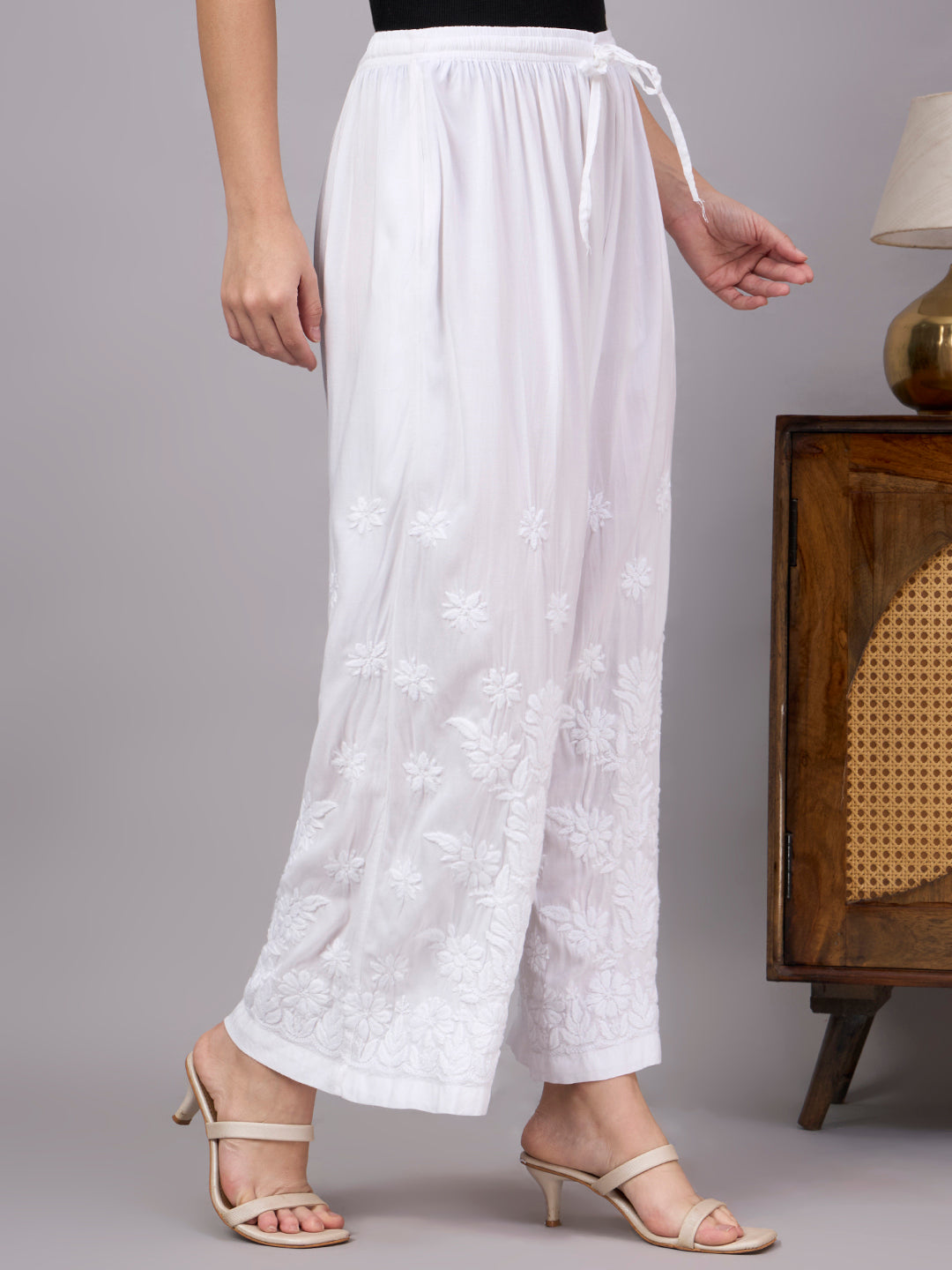 Trending bottom wear for women featuring elegant Chikankari work and versatile styling with kurtis, tops, and tunics