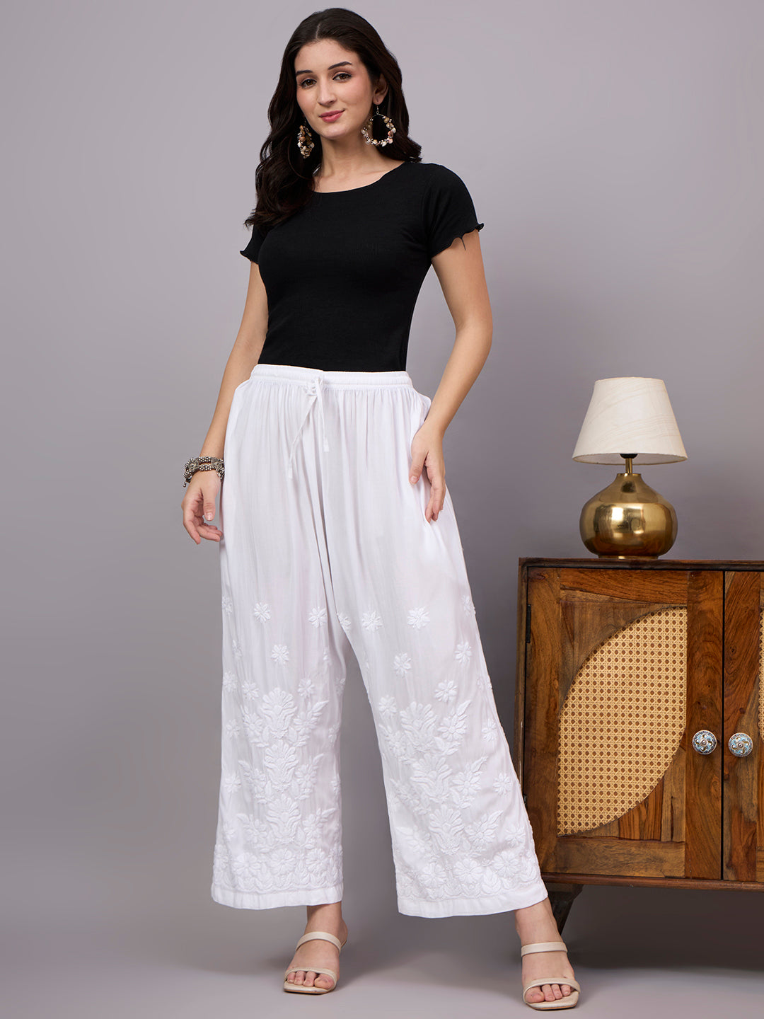 Comfortable regular wear bottom with beautiful Chikankari embroidery and straight fit silhouette perfect for daily ethnic outfits