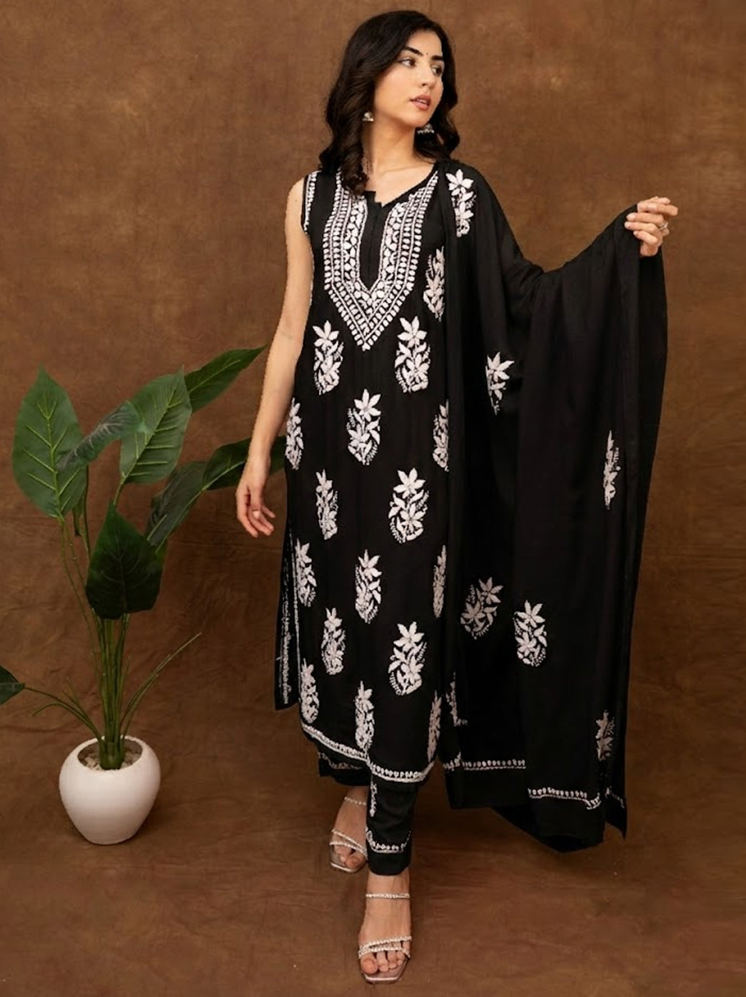 Premium chikankari kurta with intricate hand embroidery on neckline and body, styled with straight pants and matching dupatta for festive occasions