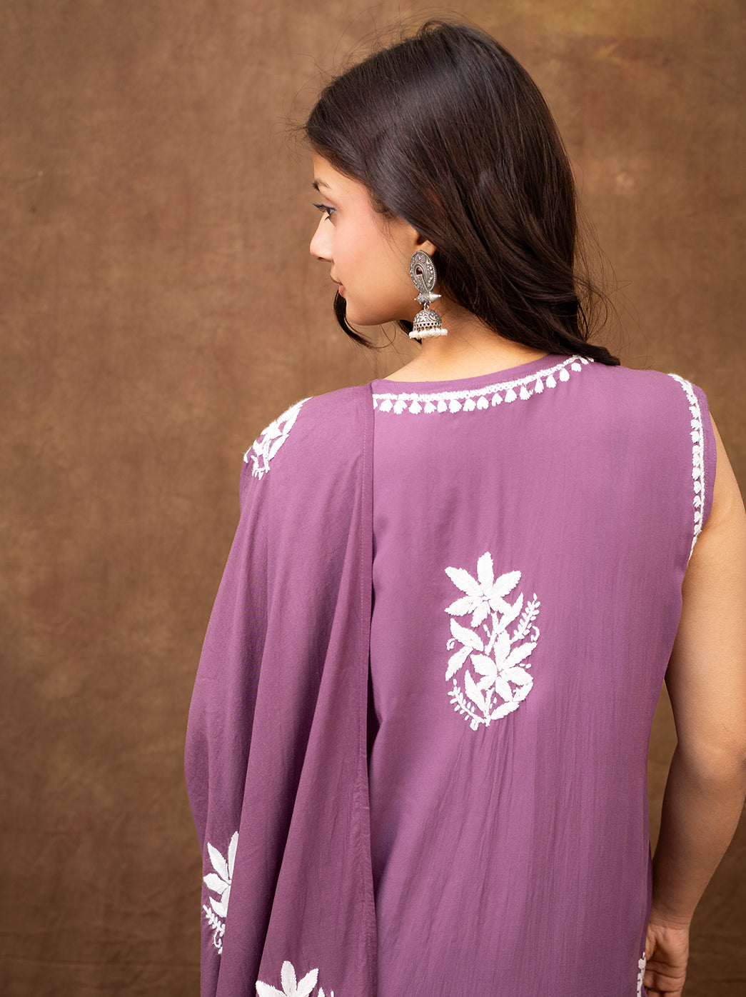 Ethnic hand chikankari embroidered kurta set with detailed neckline work, straight pants, and dupatta, designed for cultural and festive occasions