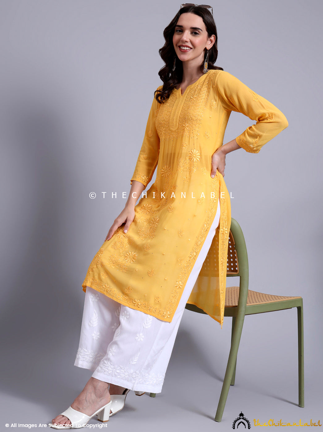 Elegant ethnic kurti showcasing traditional Chikankari craftsmanship with subtle mukaish work.

