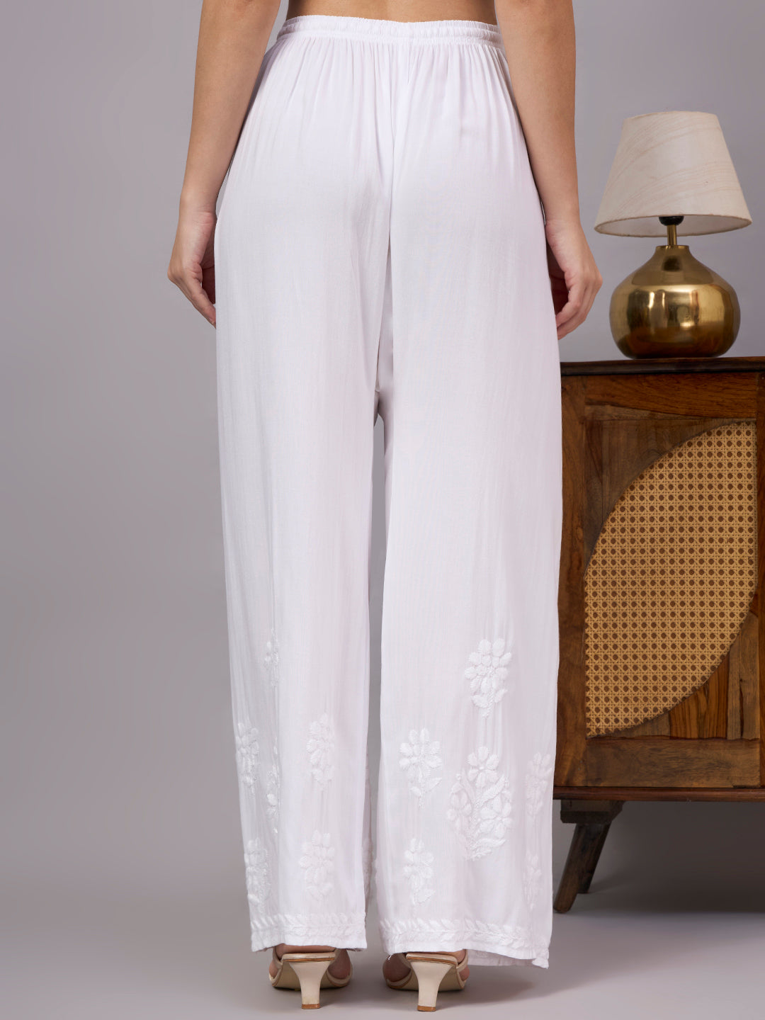 Trending bottom wear for women featuring elegant Chikankari work and versatile styling with kurtis, tops, and tunics