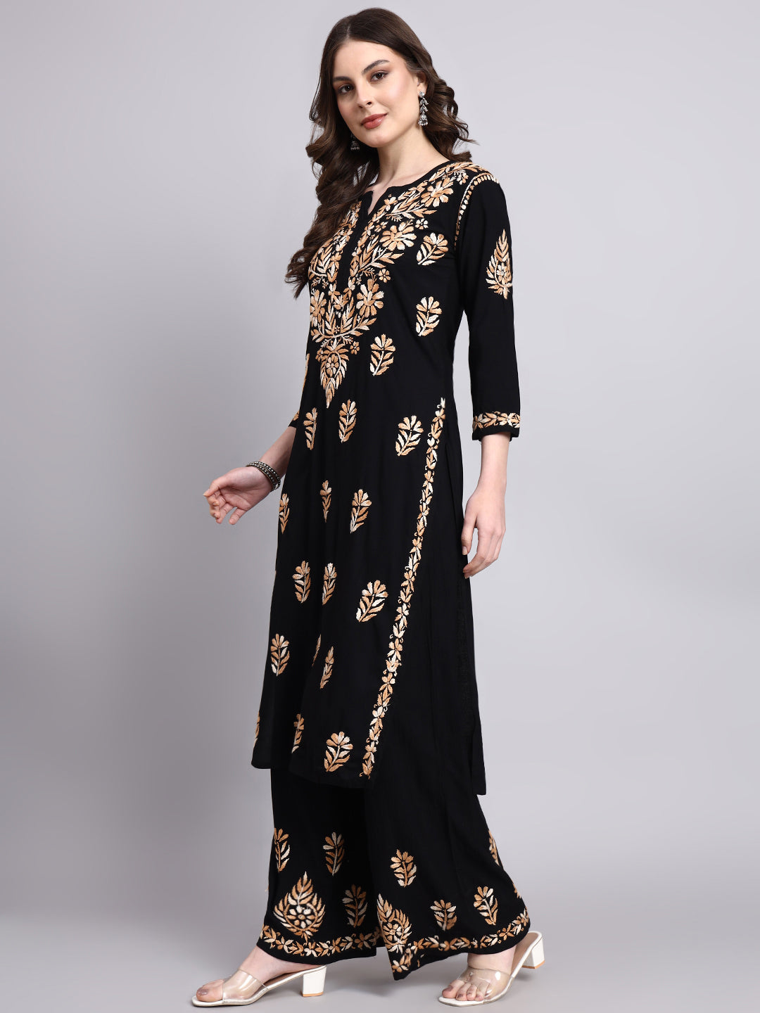 Traditional rayon chikankari kurta palazzo set with delicate Lucknowi chikankari work perfect for festive and ethnic occasions