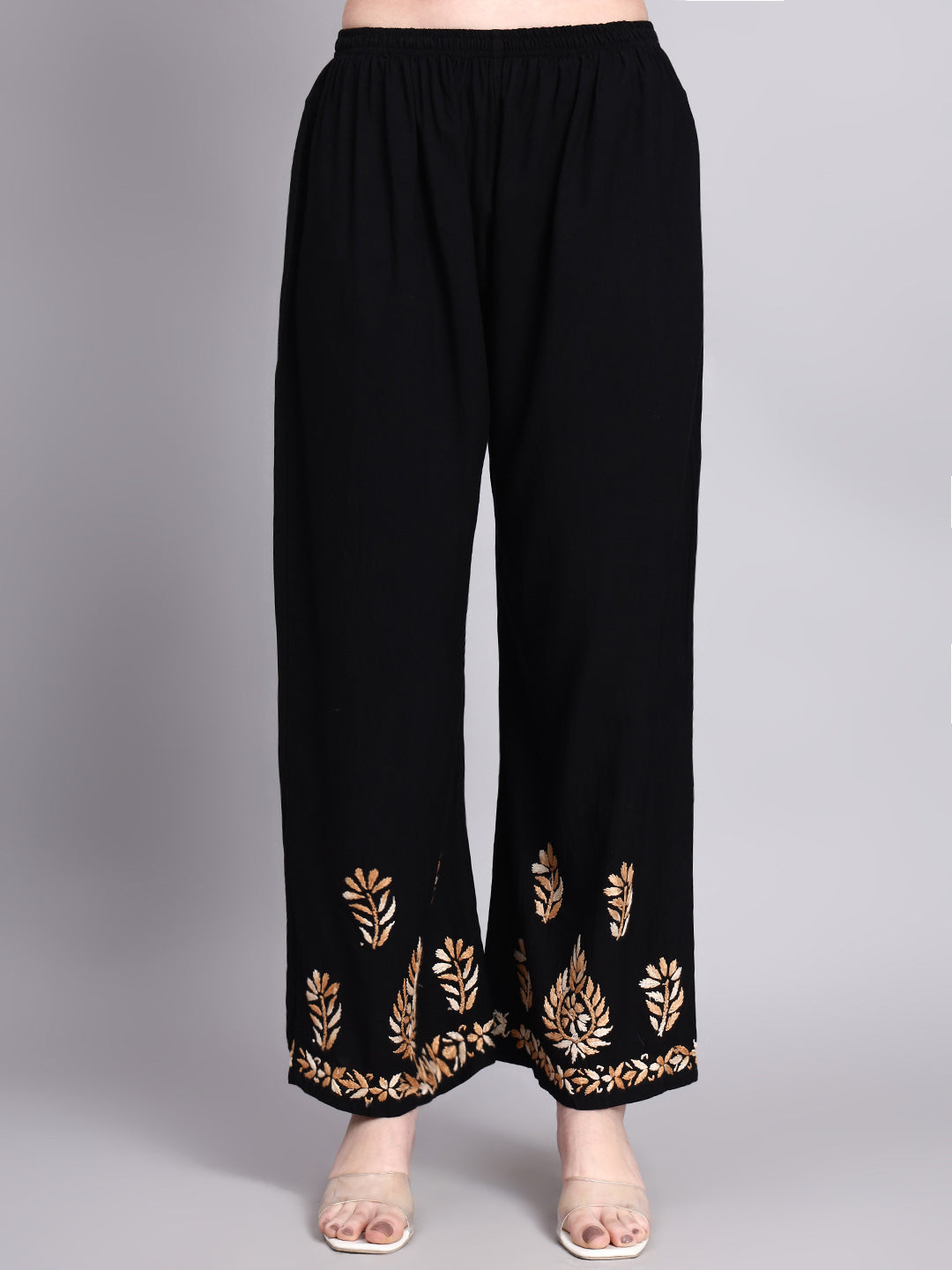 Stylish women’s ethnic wear set featuring rayon chikankari kurta palazzo set with elegant handcrafted embroidery patterns