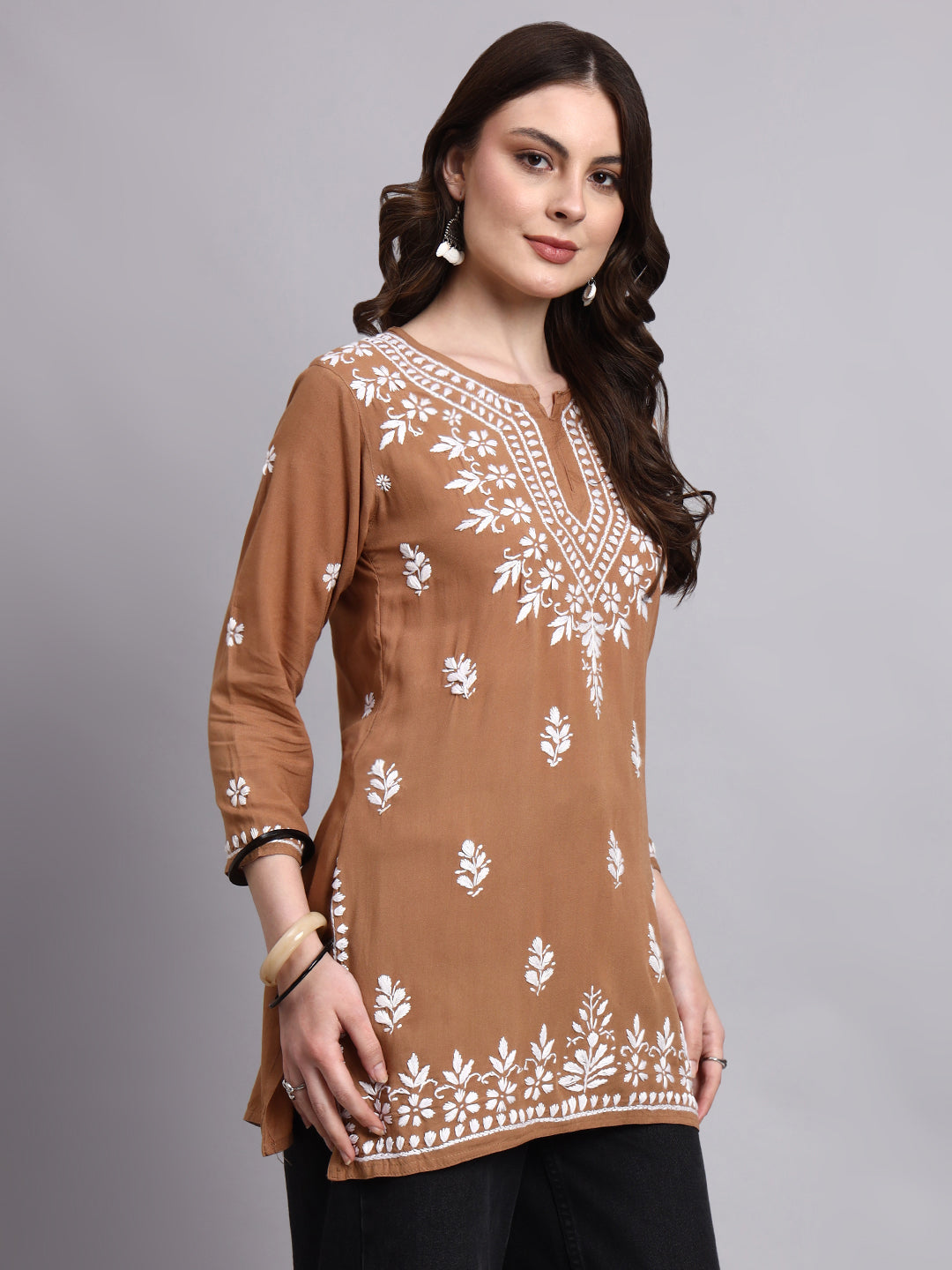 Handcrafted rayon short kurta showcasing delicate chikankari motifs for modern ethnic and fusion styling