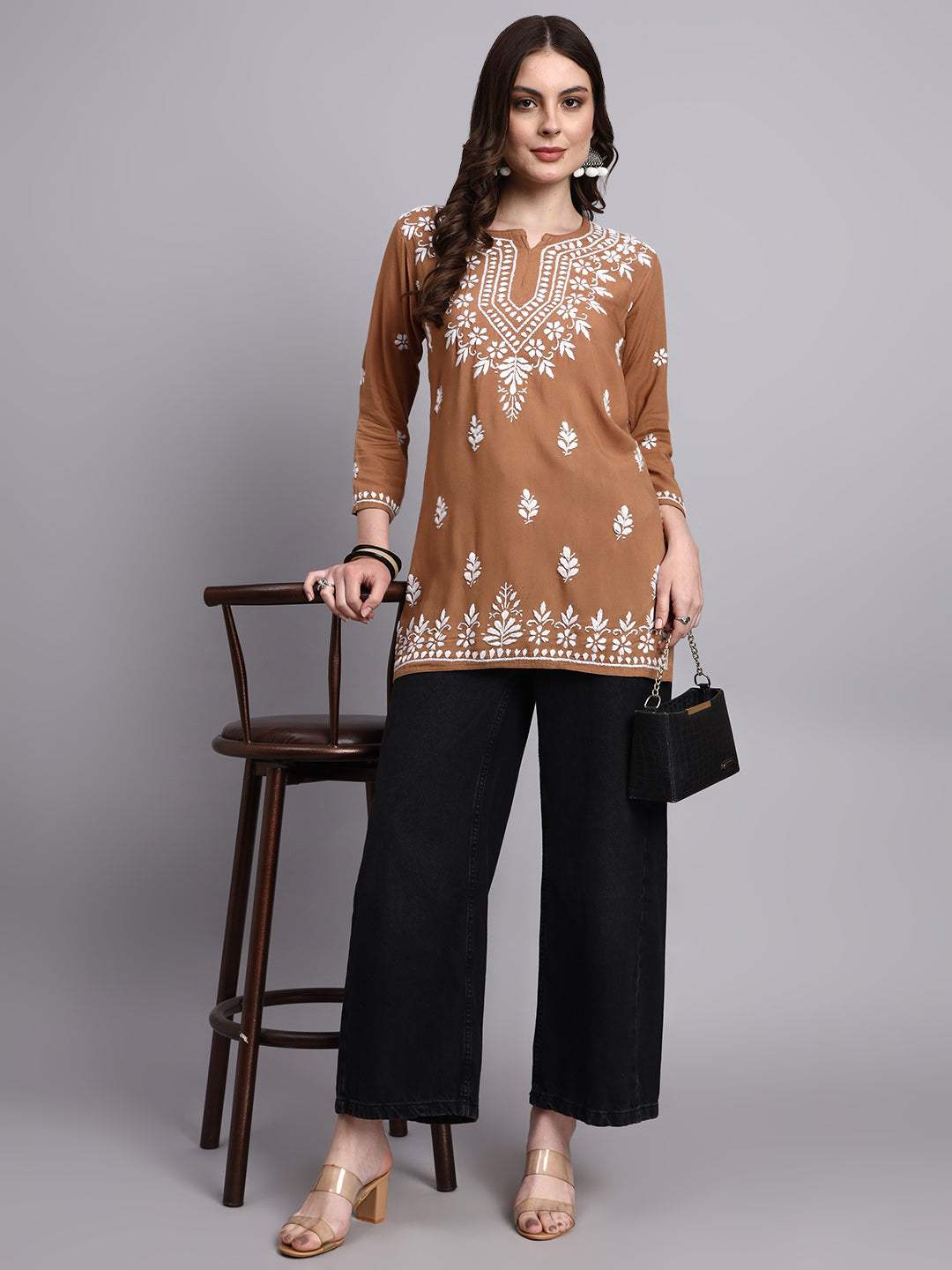 Trending short top for women made with rayon fabric and hand-embroidered chikankari work for all-day comfort