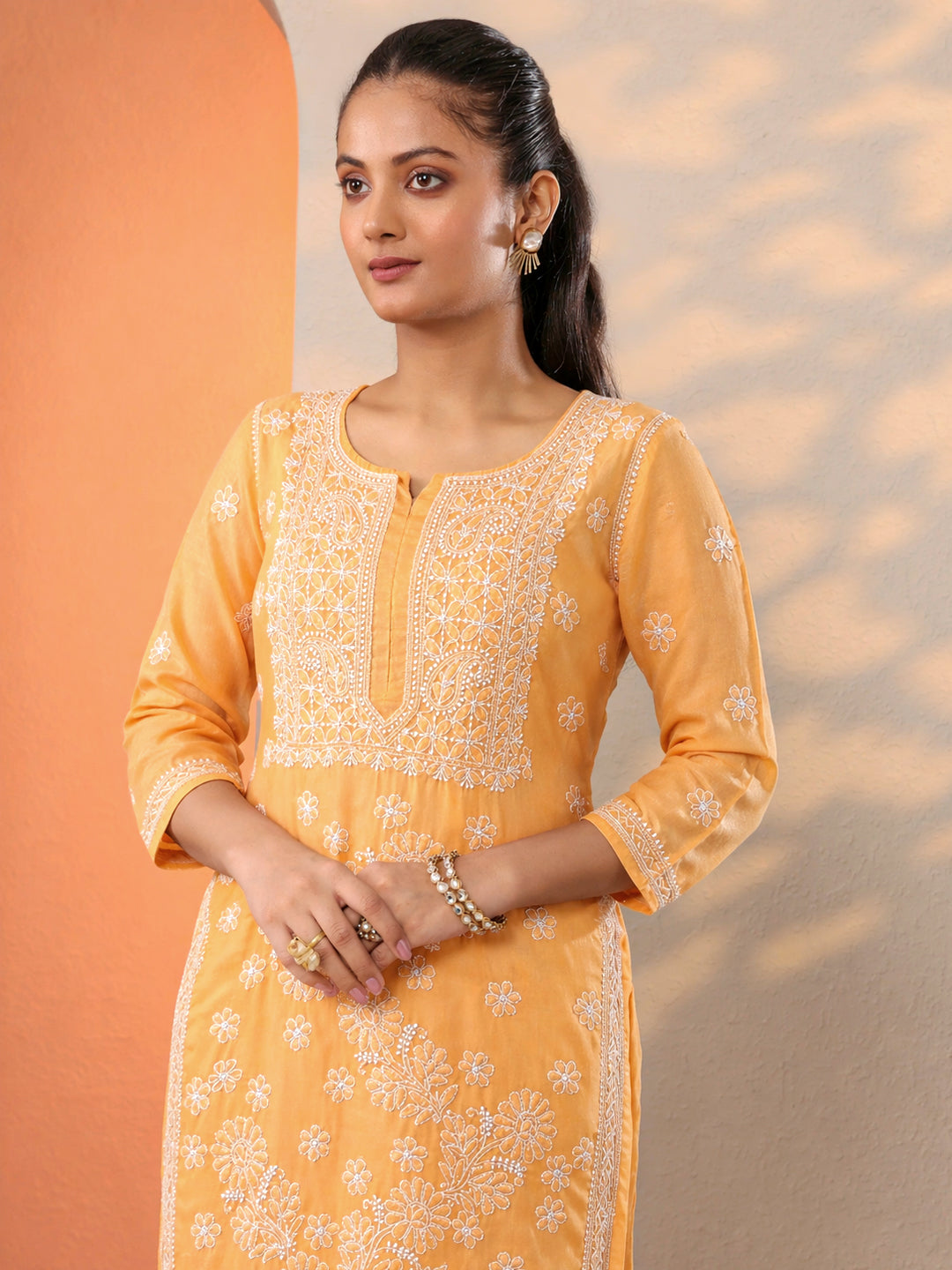 Comfortable regular wear kurti with straight silhouette and delicate chikankari embroidery for modern women