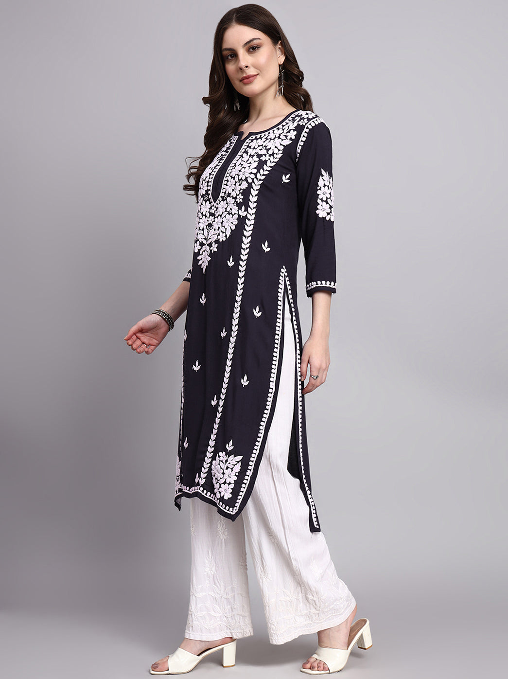 Premium women’s chikankari long kurta highlighting artisan craftsmanship breathable material and timeless design