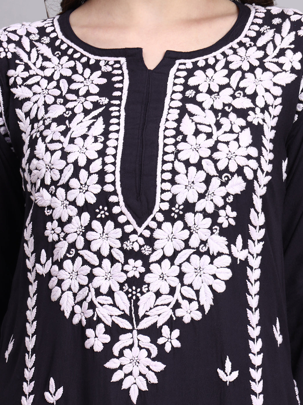 Traditional Indian chikankari embroidered long kurta showcasing straight fit silhouette and delicate handwork by artisans