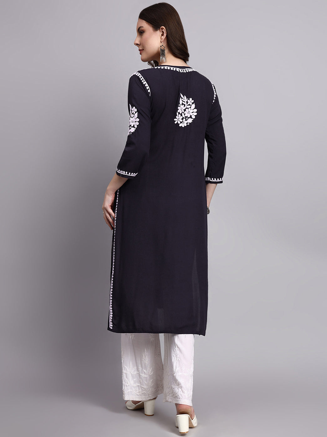 Women’s handcrafted chikankari kurti featuring detailed embroidery on rayon fabric styled with ethnic bottoms