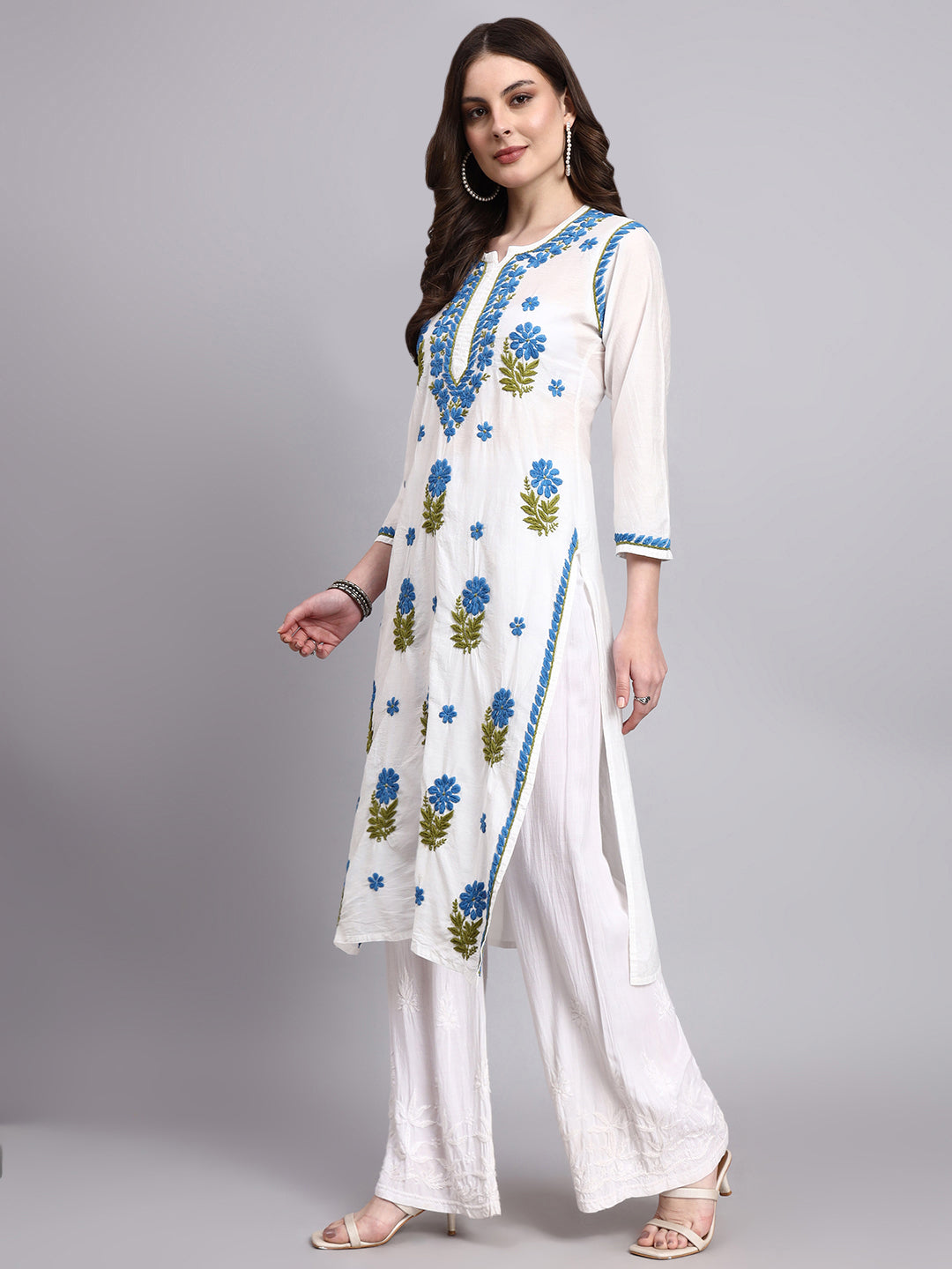 Handcrafted chikankari straight long kurta showcasing floral embroidery patterns inspired by Indian craftsmanship
