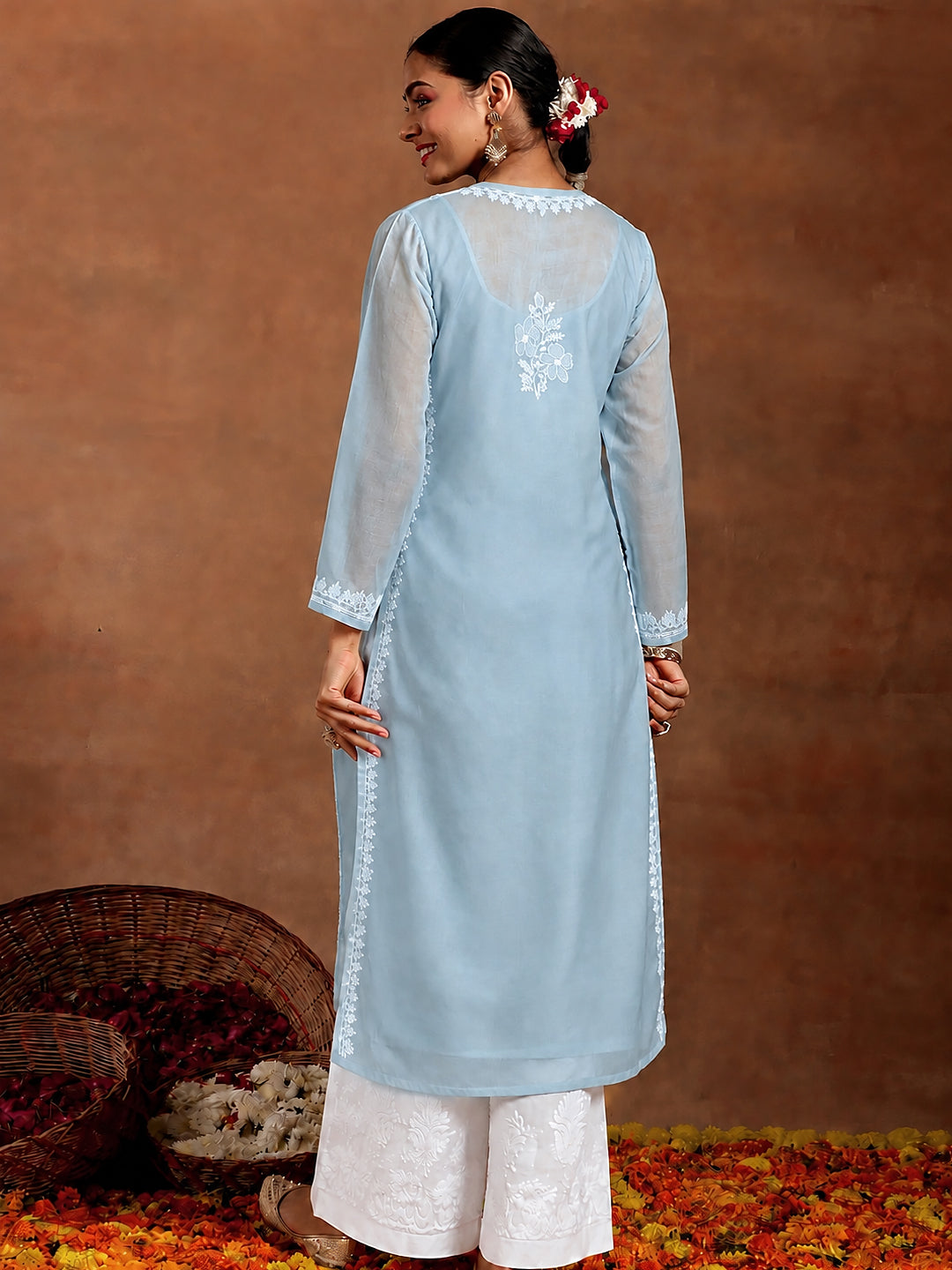 Elegant Chikankari Kurti with inner crafted from breathable cotton, featuring a classic straight silhouette and detailed embroidery for comfortable regular wear.