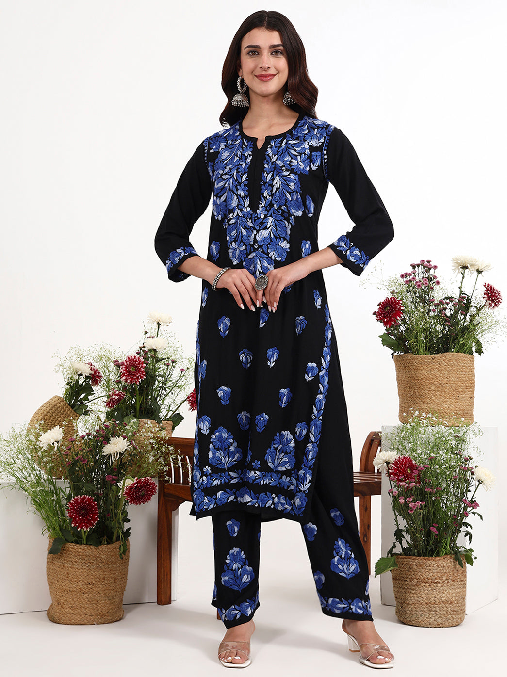 Women wearing chikankari kurti palazzo set with detailed front panel embroidery design