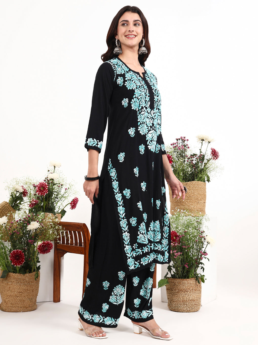 Traditional chikankari embroidery kurti with all over motifs and coordinated palazzo bottom