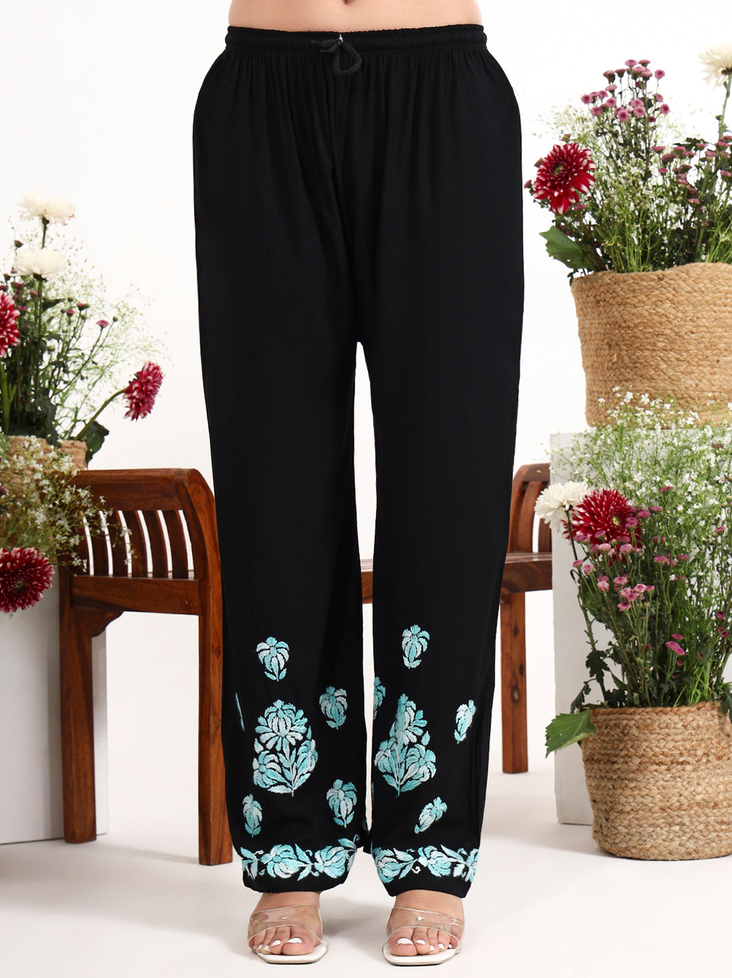Women wearing chikankari kurti palazzo set with fine embroidery and relaxed fit silhouette