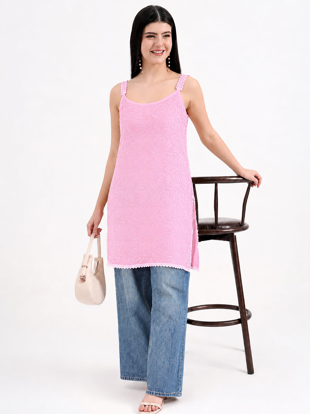 Esha Viscose Short Strappy Kurti featuring delicate floral embroidery, a modern sleeveless silhouette and a comfortable design for casual everyday styling.