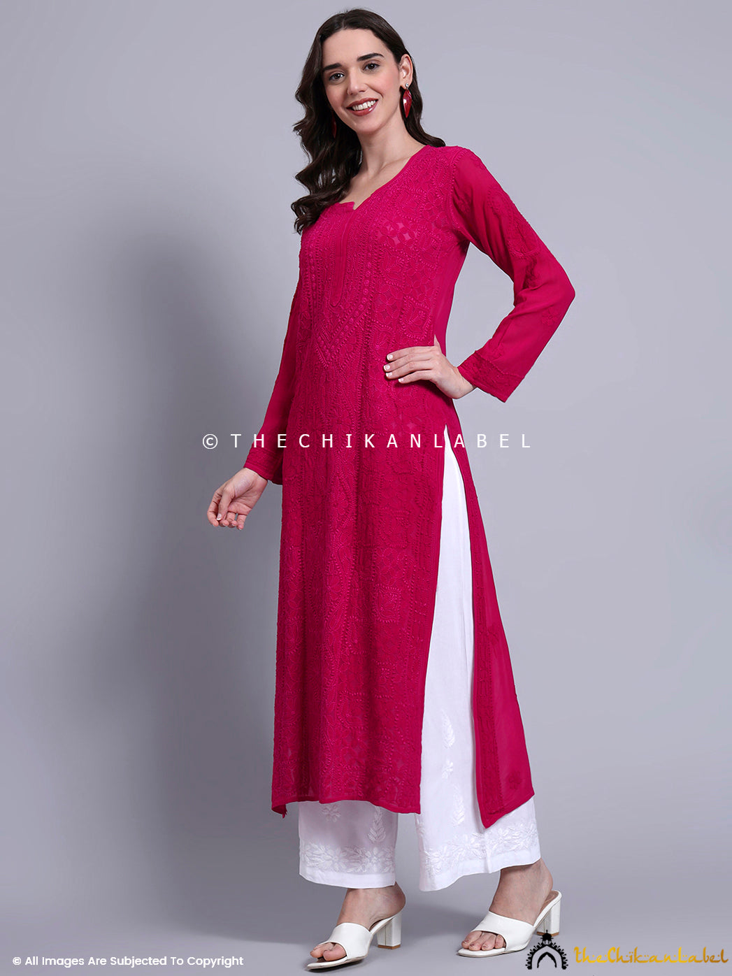 Ethnic wear lookbook image of a chikankari kurti with side slits and artisan embroidery crafted on soft viscose material.

