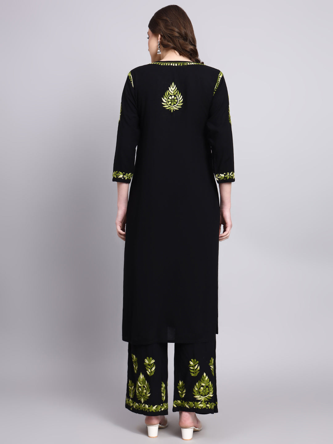 Designer Niya rayon chikankari kurta palazzo set featuring intricate floral chikankari patterns and elegant ethnic wear silhouette